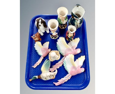 A tray of ceramic flying parrot ornaments, duck plaque, Nao figure of a child, character jugs etc.