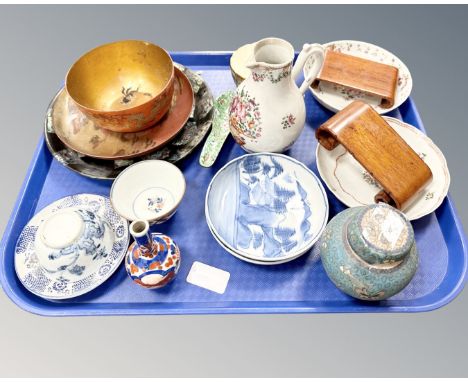 A tray of 18th century and later oriental wares including Chinese blue and white plates, hardwood stands, lidded ginger jar (