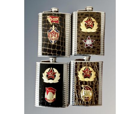 A collection of USSR armed forces flasks together with a KGB flask.