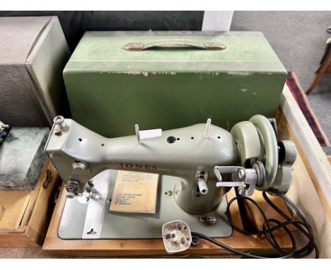 A vintage Jones sewing machine with lead. CONDITION REPORT: no pedal.