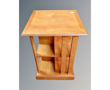 A 20th century teak book table 