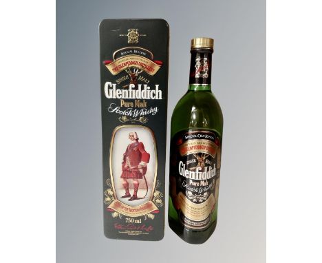 A bottle of Glenfiddich pure malt scotch whisky 70cl.