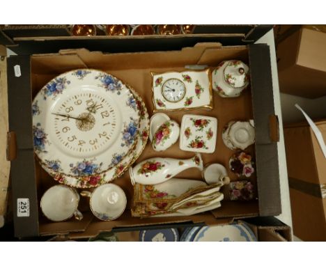 A collection of Royal Albert Old Country Rose items to include clocks, vases, pin trays, trinket boxes, etc. 