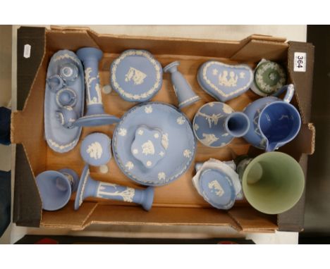A good collection of Wedgwood of blue and sage green items to include miniatures, trinket boxes, plates, etc.