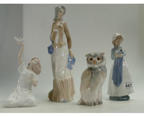 A mixed collection of Nao style continental figures to include comical owl, Nadal figure of girl with dog, girl with puppy an