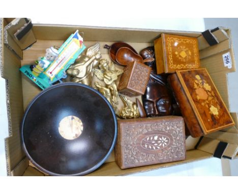 A mixed collection of items to include wooden jewellery boxes, Burmese wooden wall plaques, gild wall cherubs, Burmese trinke