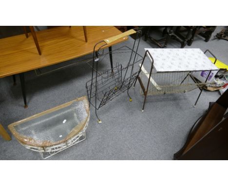 Retro mid-century metal items to include magazine rack with musical notation detail, other topped magazine rack and glass top