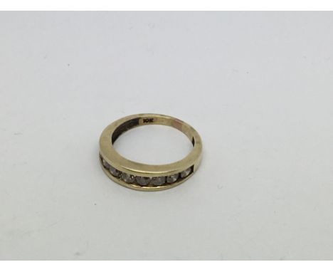 A 10ct gold Half eternity ring set with 9 diamonds approx 1ct. Size m/n approx weight 3g