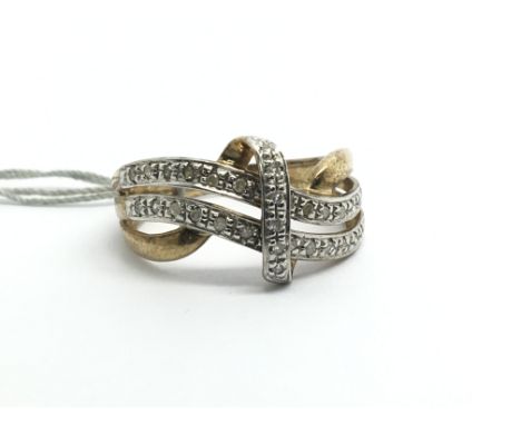 A 9ct yellow gold ring set with diamond bands, approx 0.25ct, weight approx 2.5g, ring size N/O