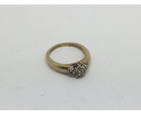 A 9ct gold ring set with Diamond cluster approx 0.25ct. Size q/r approx weight 4.4g