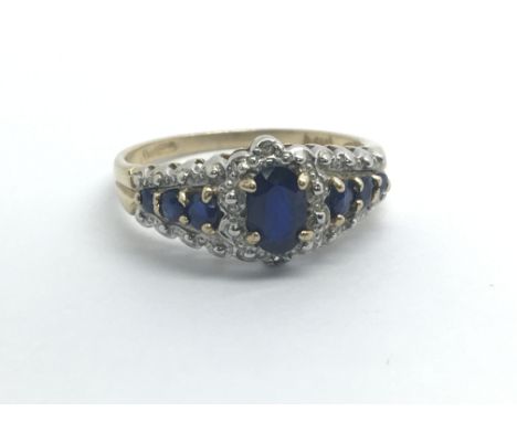 A 9ct yellow gold ring set with sapphires and diamonds, approx 2.5g, ring size approx O