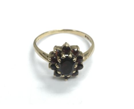 A 9ct gold garnet cluster ring, approx 2.6g and approx size R.