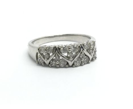 An 18ct white gold and diamond half eternity cluster ring, approx 0.5ct, weight approx 3G, ring size approx N