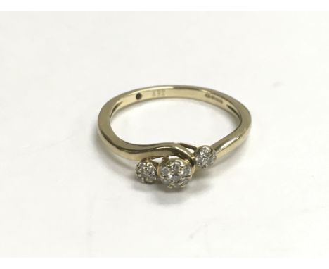 A 9ct gold ring set with a pattern of diamonds, approx 2.4g and approx size R-S.