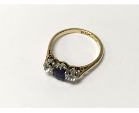 An 18ct gold and platinum mounted sapphire and diamond ring, 2.4g, (L)