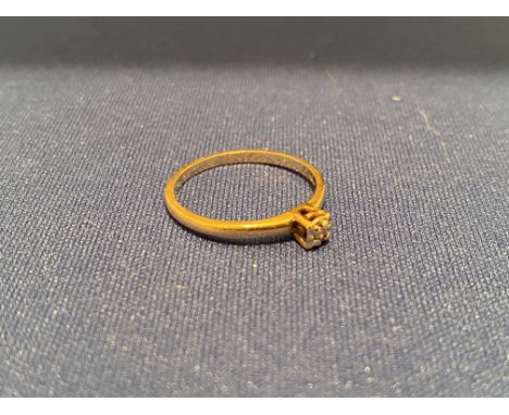 A 10ct gold solitaire diamond ring, 1.4g, O.