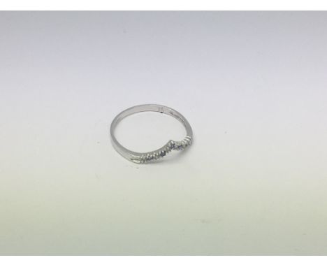 A 9ct white gold ring set with sapphire and diamonds. Size m/n approx weight 0.7g