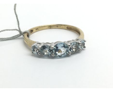 A 9ct yellow gold ring set with a row of five aqua coloured stones, weight approx 1.7g, ring size approx Q/R