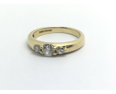 An 18ct yellow gold and three stone diamond ring, approx 0.33ct, weight approx 3.2g, ring size approx J