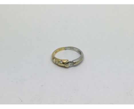 An 18ct gold ring set with 4 diamonds approx 0.30ct. Size n approx weight 2.8g
