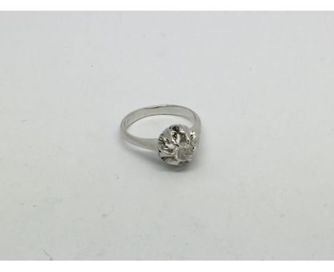 An 18ct white gold ring set with a rose cut diamond solitaire. Size j/k approx weight 3.9g