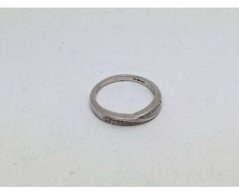 A platinum ring set with small diamonds approx 0.5ct. Size m/n approx weight 3.6