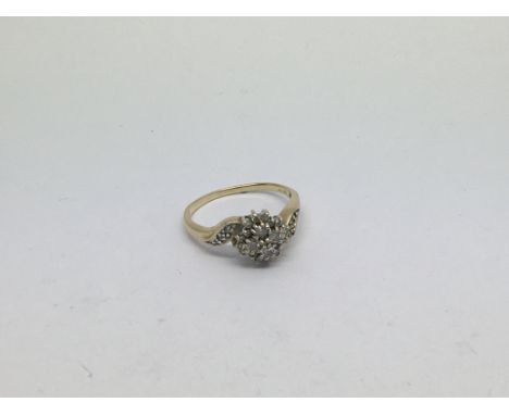 A 9ct gold ring set with diamond cluster approx 0.5ct. Size p approx weight 2.5g