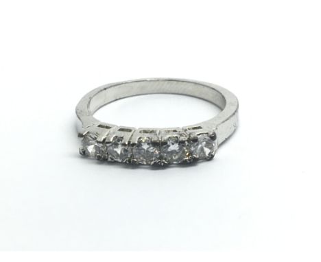 An 18ct white gold ring with a row of five diamonds, approx 0.60ct, weight approx 2g, ring size approx M