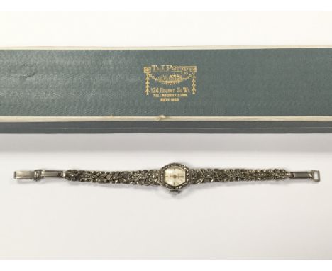 A vintage silver and marcasite ladies watch in box