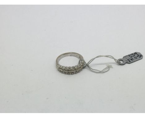 An 18ct white gold ring set with 3 rows of diamonds 28 in total approx 0.5ct. Size h/I approx weight 2.9g
