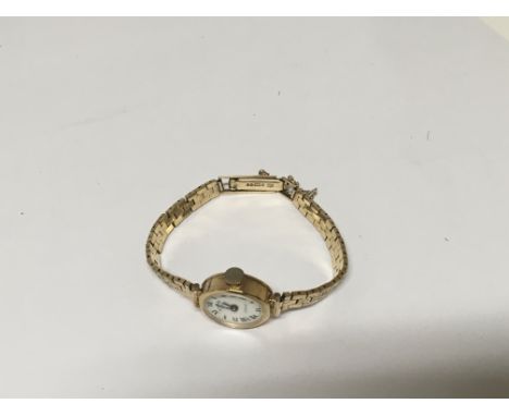A ladies 9carat gold Rotary watch total weight 13g.