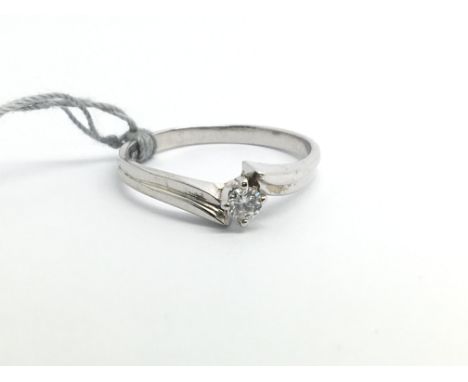 A 9ct white gold ring set with 10 point diamond solitaire, approx 1.5g, ring size approx L/M