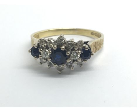 An 18ct yellow gold sapphire and diamond cluster ring, approx 0.33ct, weight approx 4.3g, ring size P/Q