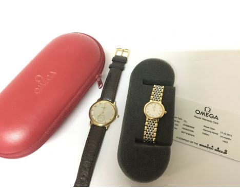 A Ladies stainless steel and gold tone Omega wrist watch with warranty card and box and a Gents Rotary watch.( Both not seen 