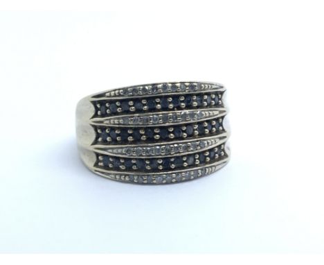 A 9ct yellow gold ring set with alternating rows of diamonds and sapphires, weight approx 5g, ring size approx R