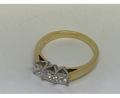 An 18ct yellow gold princess cut 3 stone diamond ring. Diamonds 1.00ct. Ring size N