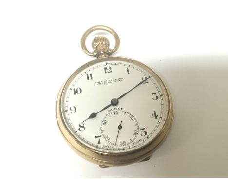 A 9carat gold cased button wind pocket watch Buren Grand Prix Swiss Made. Seen working the dial with further retailers inscri