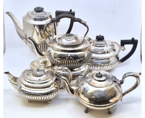 A large quantity of silver plated table ware, to include; spirit kettle with stand and burner, tea and coffee pots, trays, as
