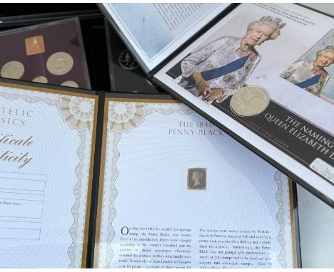 A collection of various collectors coins and a penny black stamp&nbsp;