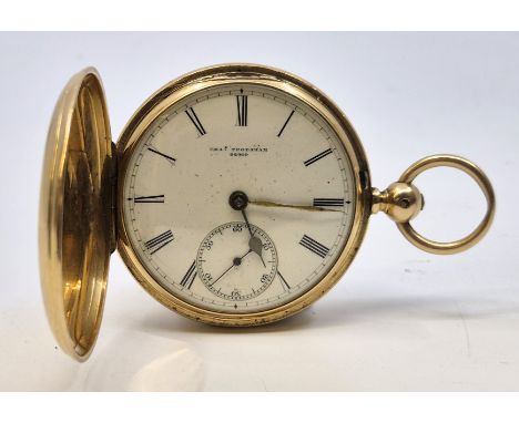 A Chas. Frodsham 18ct. gold hunter pocket watch, key wind, having signed white enamel Roman numeral dial with subsidiary Arab