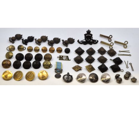 A collection of Royal Artillery brass buttons, together with a silver Scottish clan kilt pin/badge, by Wilson &amp; Sharp, Ed