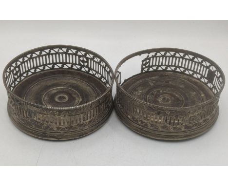A pair of 19th century white metal wine coasters with pierced decoration A/FLocation:If there is no condition report, please 