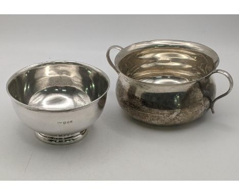 Silver to include a twin handled sugar bowl hallmarked 1921 together with silver Harrods sugar bowl, total weight 234.4gLocat