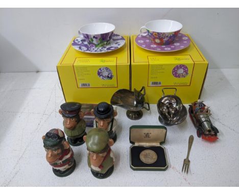 A mixed lot to include four model monkeys, silver plate, a model of Chitty, Chitty Bang Bang, two cups & saucers by Ritzenhof