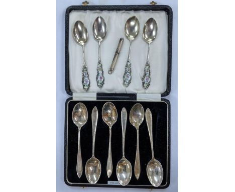 A set of four sterling silver spoons, the handles inset with floral enamel, together with an early 20th century silver toothp