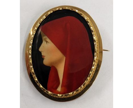 A yellow gold continental portrait brooch, overpainted depicting a woman in red hood, tested as 18ct gold, 8.8gLocation:If th