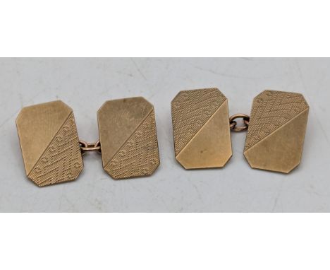A pair of yellow gold gents cufflinks with engraved decoration in rectangular form, 5.2gLocation:If there is no condition rep
