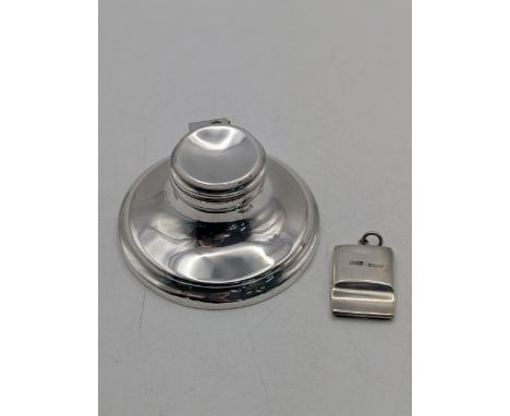 A silver Capstan inkwell and whistle, hallmarked London 1911Location:If there is no condition report shown, please request