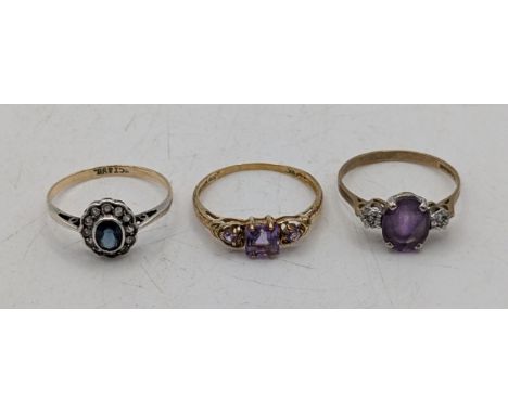 Three ladies gold rings to include a 9ct yellow gold and silver cluster set with a central blue stone surrounded by paste sto