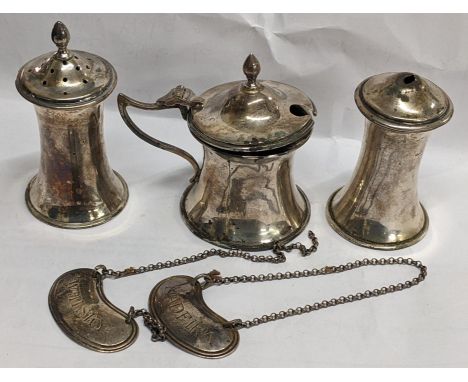 Two silver decanter labels together with an early 20th century three piece silver cruet set, combined weight (blue liner stuc